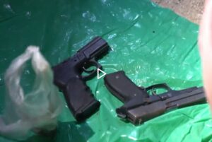 Guns found on arrest raid