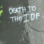 Anti-Israel graffiti on soldiers' home (Facebook)
