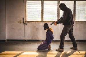 Terrorist with hostage (Shutterstock)