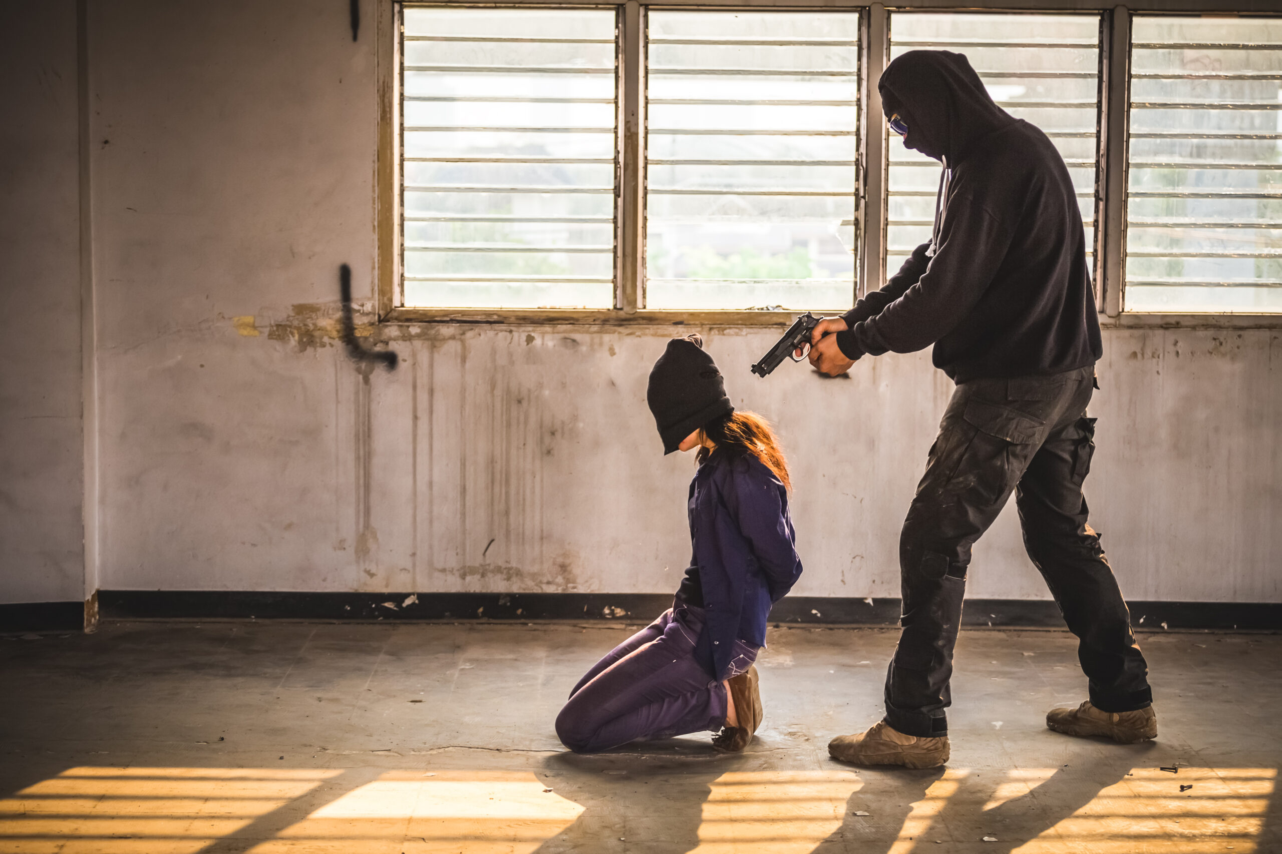 Terrorist with hostage (Shutterstock)