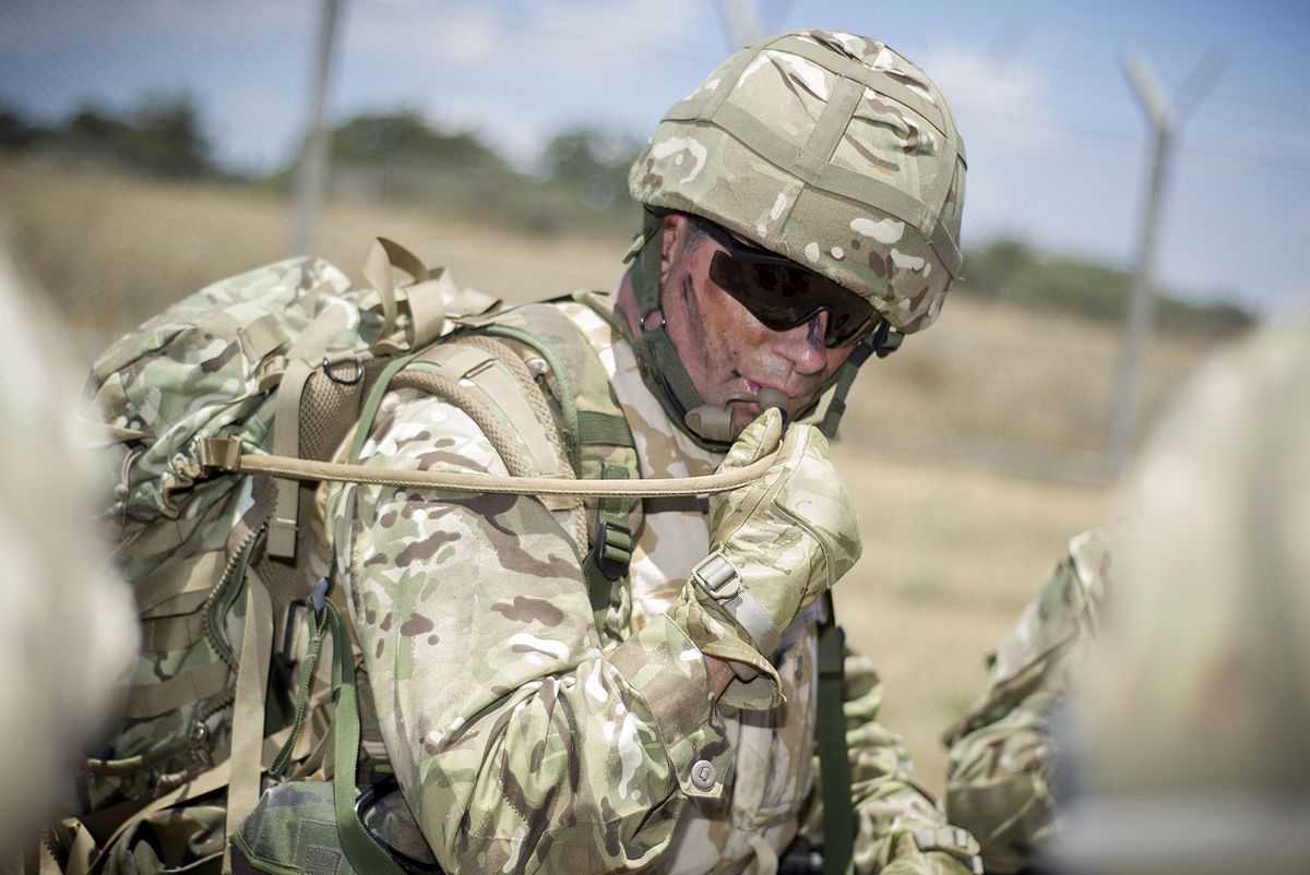 Soldier sipping water