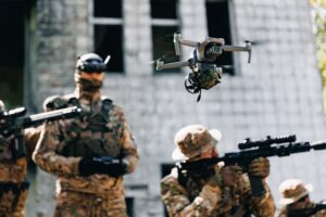 Soldiers operating drone