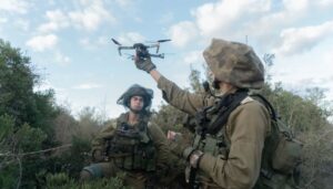 IDF soldiers launching mini drone